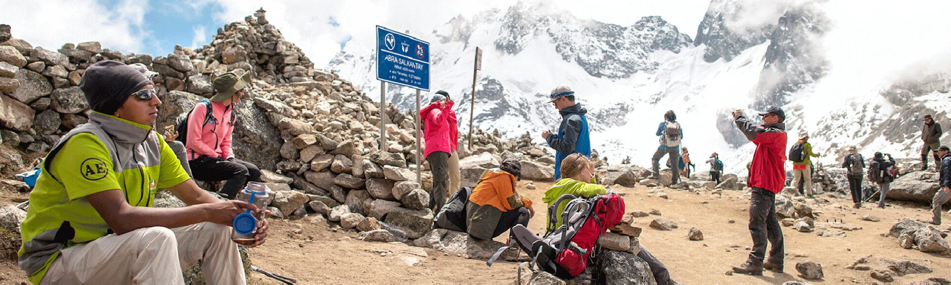 Local Quechua woman weaving textiles during the Lares Trek vs Salkantay route