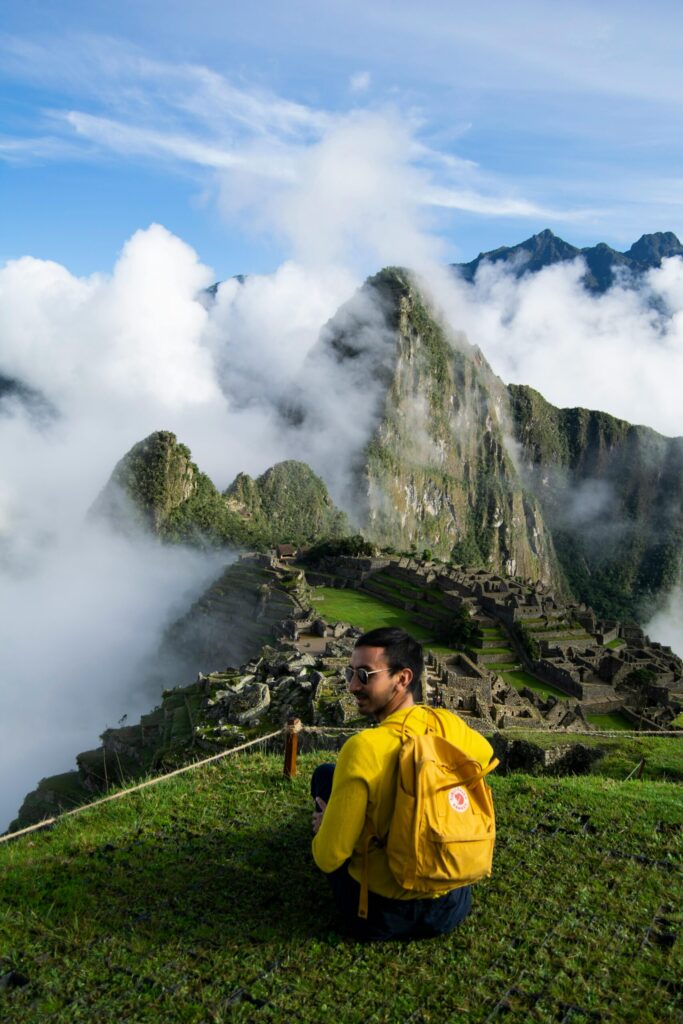 Ancient Inca citadel emerging from the morning fog after the Salkantay Trek