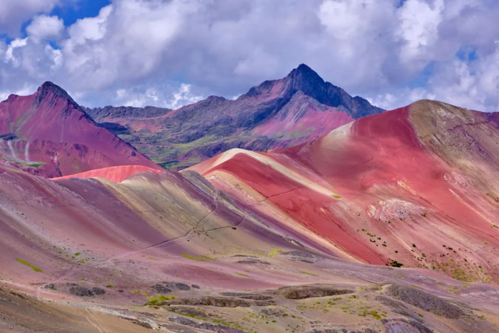 Red Valley and Rainbow Mountain viewed together on an extended tour from Cusco Peru