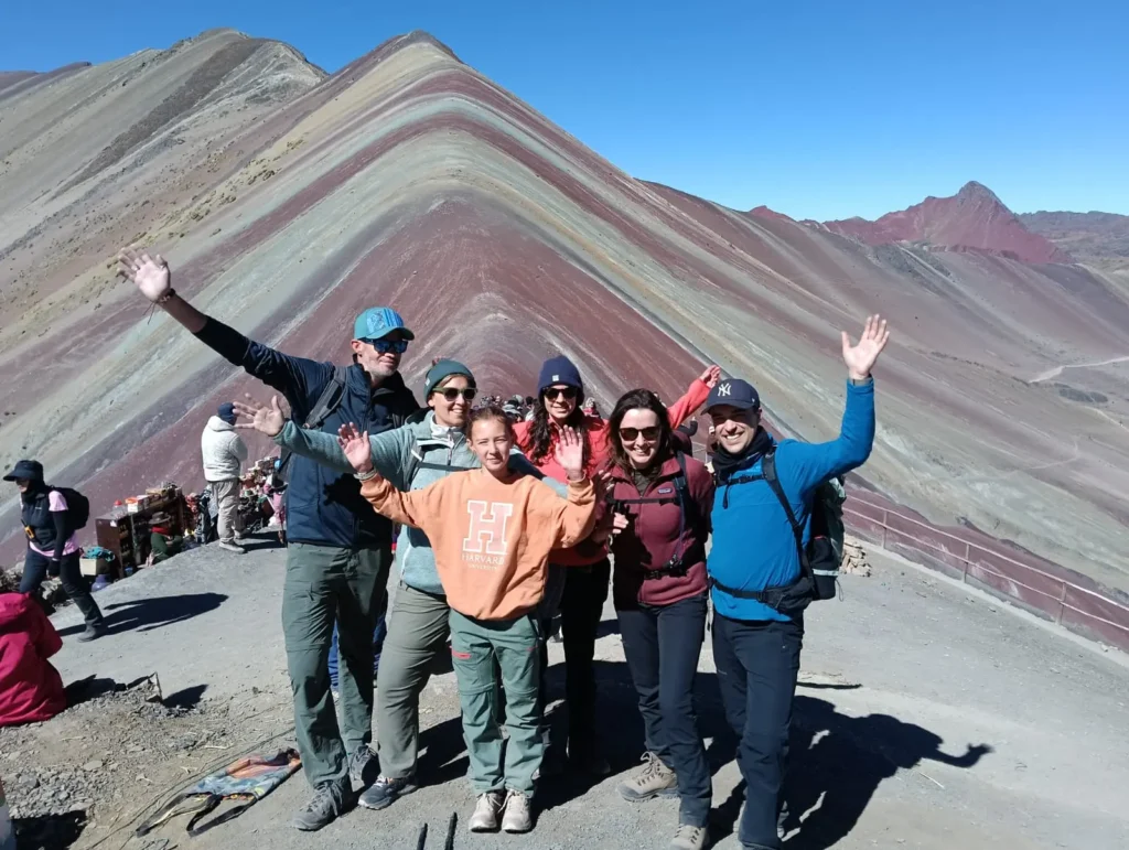 Tour group from Cusco arriving at the Rainbow Mountain trailhead early morning ready to hike