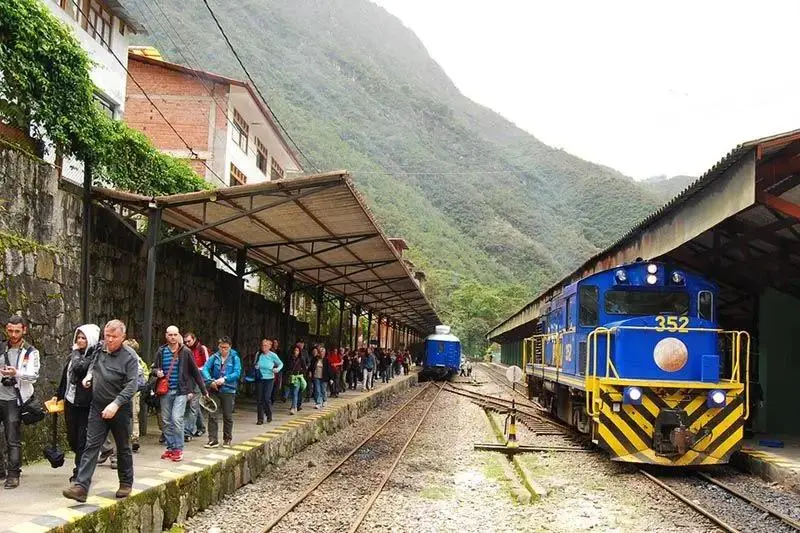 Aguas Calientes train station platform with passengers arriving from Cusco