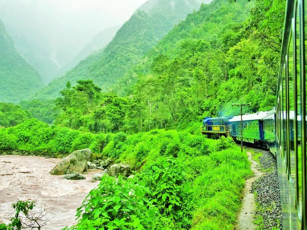 Train to Machu Picchu crossing the Andean cloud forest along the Urubamba River