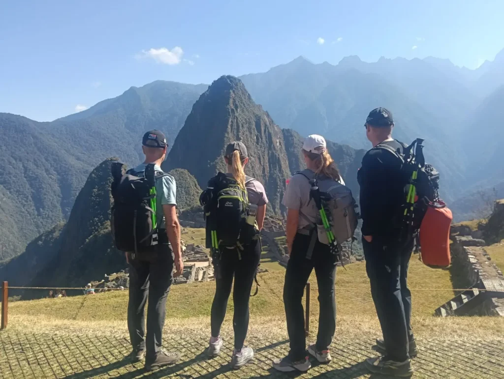 Lares Trek group arriving at Machu Picchu after four days of Andean cultural trekking