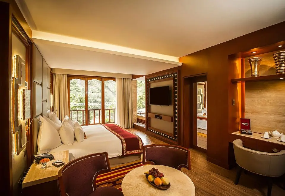 Five star hotel room with mountain views and premium amenities in Aguas Calientes