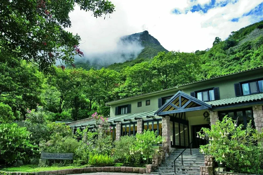 Machu Picchu luxury tours Belmond Sanctuary Lodge entrance with citadel visible